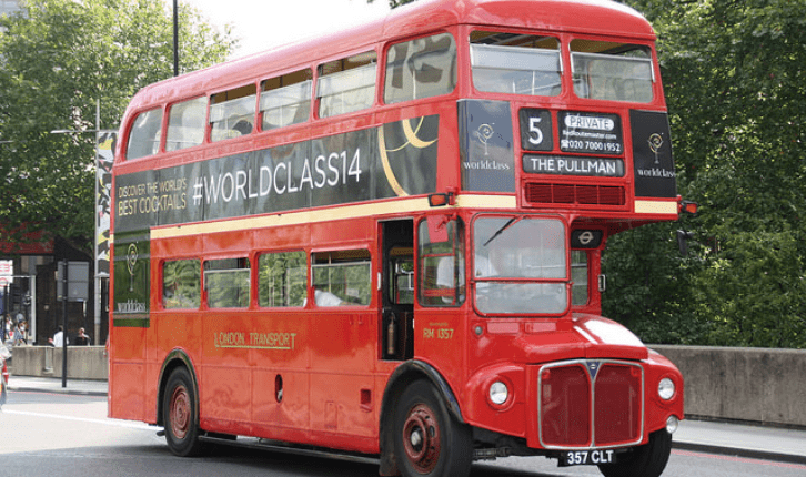 Routemaster Vintage bus on corporate hire heading towards the Pullman