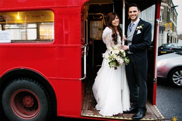Newlywed couple who hired a redaroutemaster.com bus for their wedding