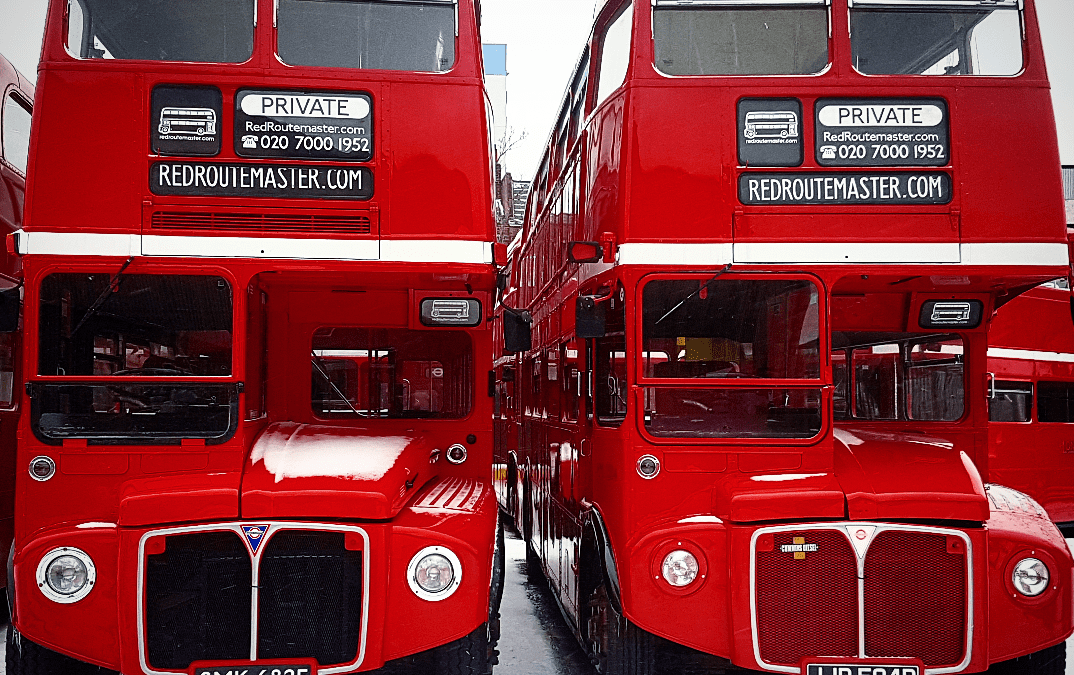 Two Routemaster Buses in the Snow
